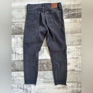 Levi’s front button up frayed hem washed black denim jeans